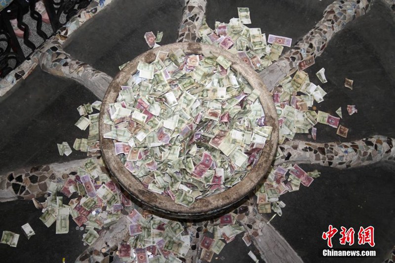 中 톈진 ‘츠팡쯔’, 항아리 속 동전 동물원에 기증