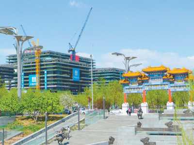 베이징 올림픽공원 중심 구역에 건설 중인 아시아인프라투자은행 본부 건물이 최근 구조 시공을 마무리해 2019년 말에 완공될 전망이다. (사진 출처: 인민시각)
