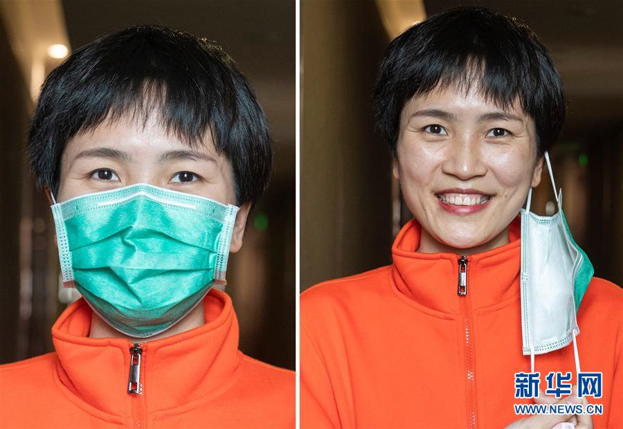 우한시 우창(武昌) 거주지에서 장시 의료팀 팀원인 쩌우옌(鄒燕)이 마스크를 벗은 채 미소를 짓고 있다. [사진 출처: 신화망]