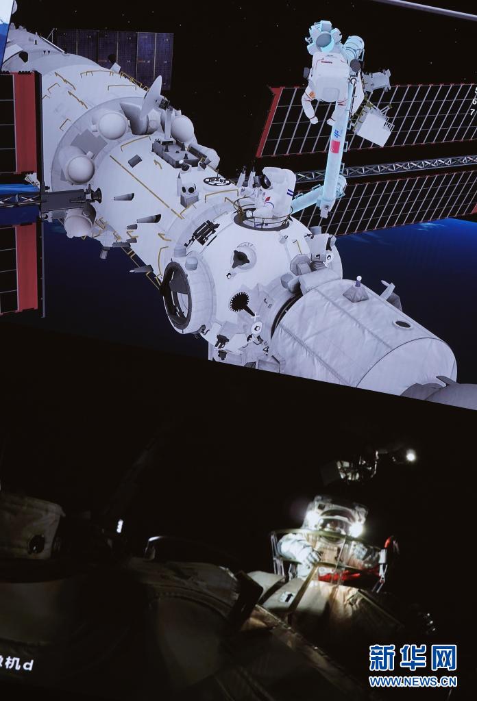 20일 베이징우주비행통제센터(BACC)의 대형 스크린에 선저우 12호 우주 비행사인 류보밍이 선외 작업을 준비하는 모습이 포착되었다. [사진 출처: 신화망]