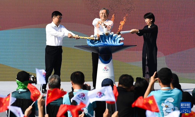 제12회 中 소수민족 전통 스포츠 운동회 성화 봉송 시작