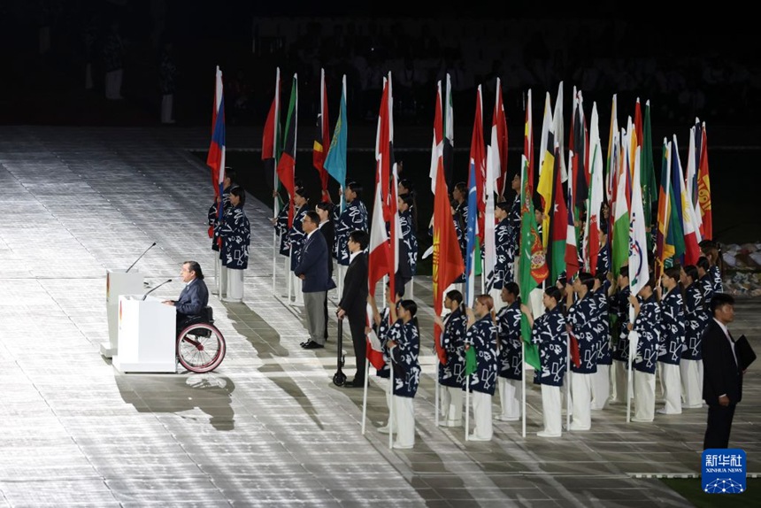 마지드 라셰드(Majid Rashed) 아시아패럴림픽위원회(APC) 위원장이 개막식에서 축사를 하고 있다. [10월 18일 촬영/사진 출처: 신화사]